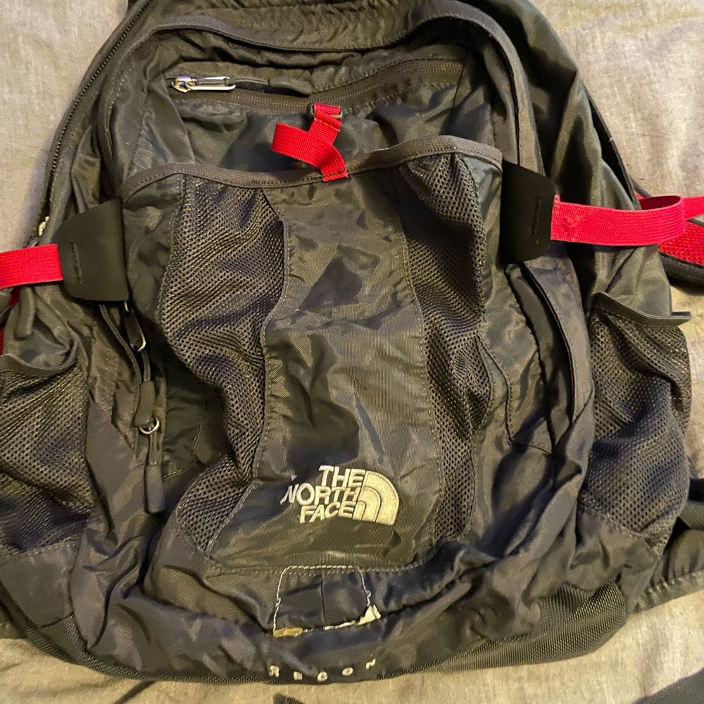 The North Face Black and Red Backpack Durable Outdoor Essential